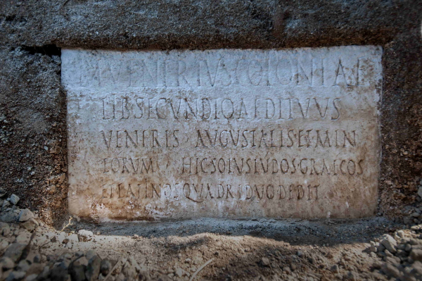 The inscription contains references to the life of the Buried 